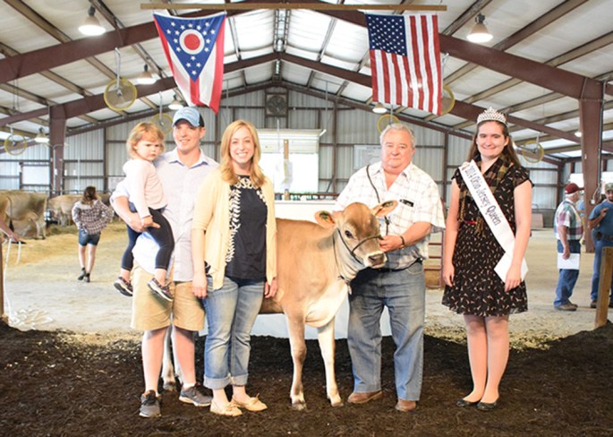 LOT 8 - CLOVERFIELD GOLDHAMMER GRACE is an Intermediate Calf from Craig Martin, Charlotte, MI. With a final bid of $5,100, Phil Gordon, Ind., was the final buyer.